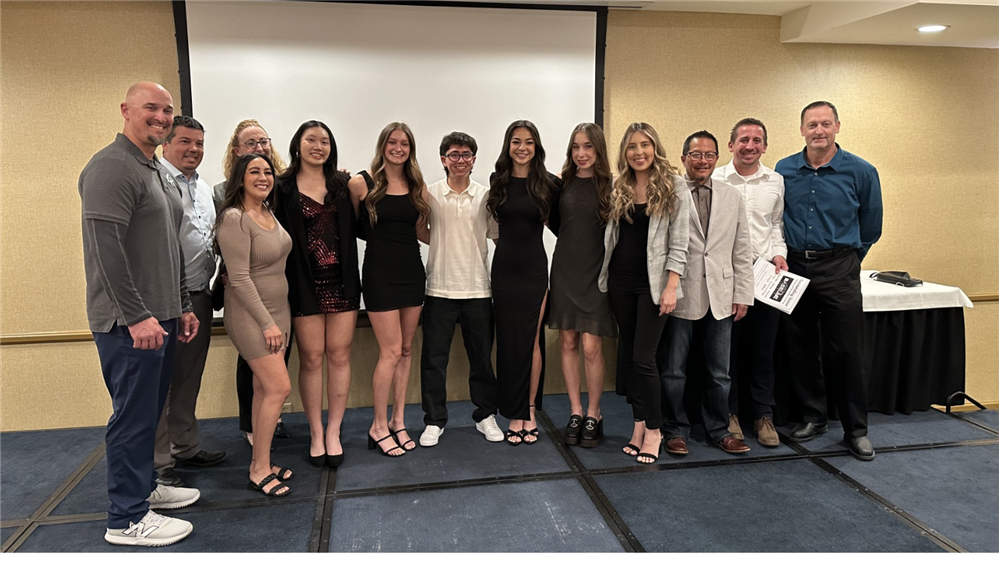  Students and administrators pose with each other during the awards ceremony. 