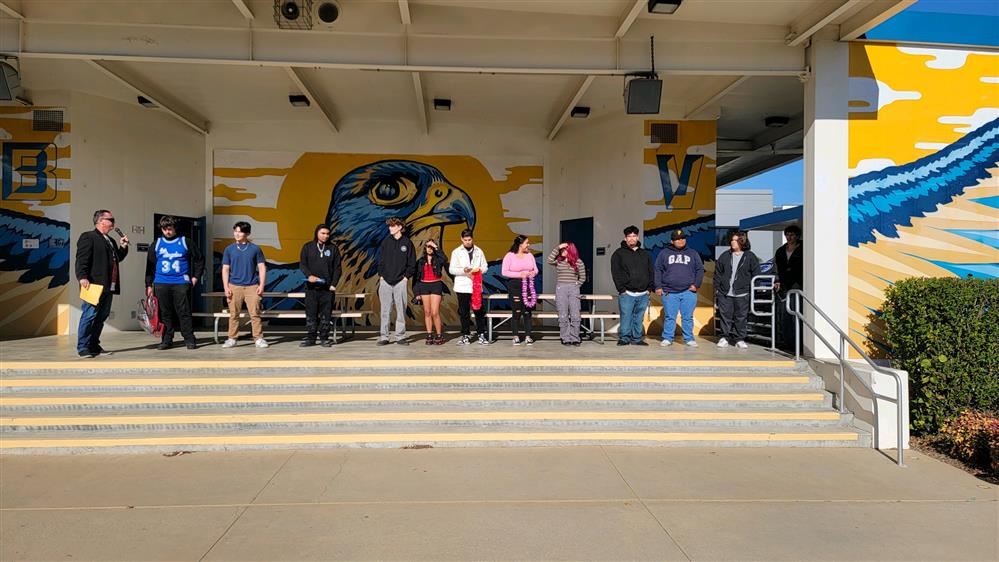 stage with December Graduates